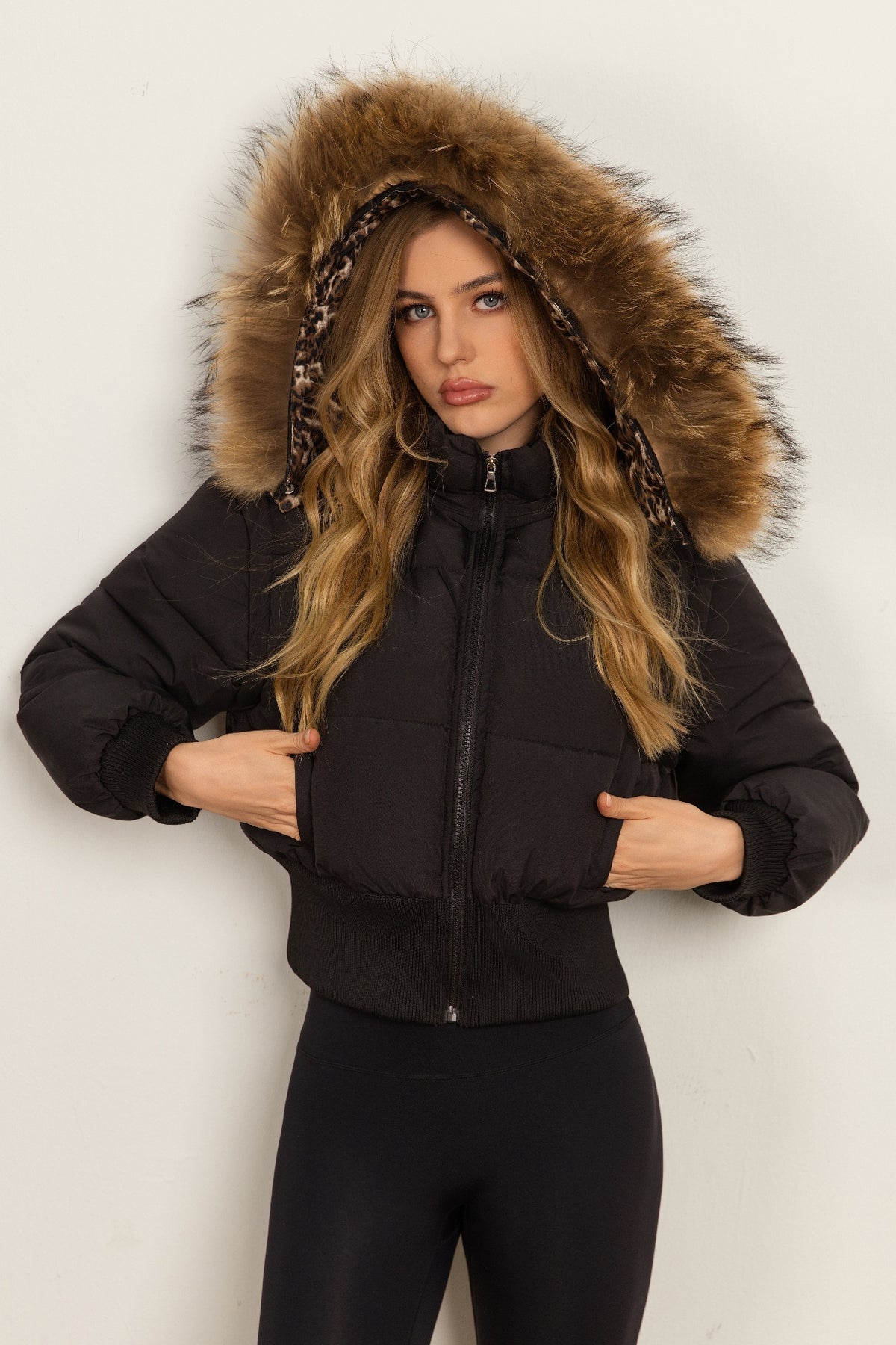 Classic Down Jacket Featuring A Detachable Fur Collar and An Attached Hood.