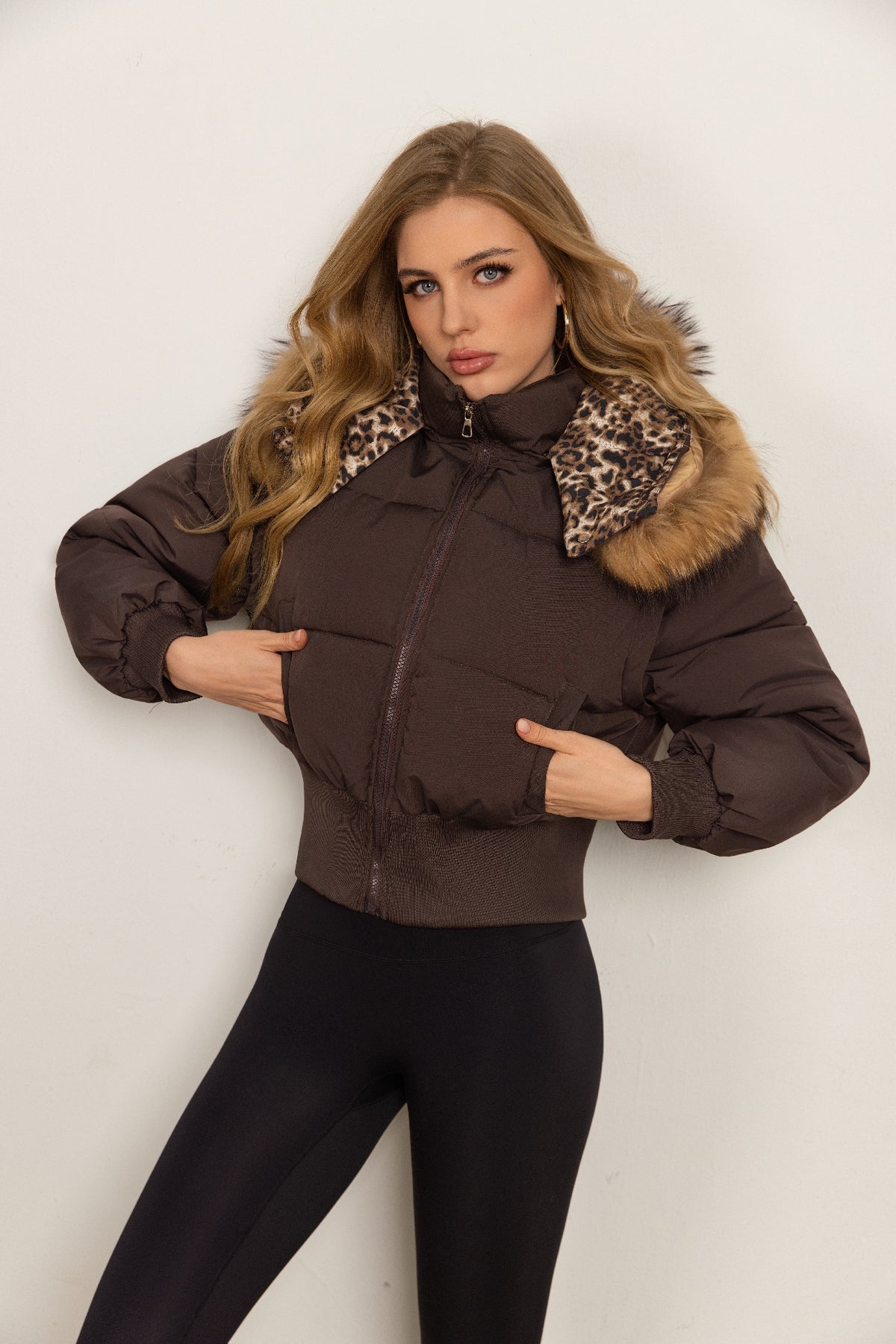 Classic Down Jacket Featuring A Detachable Fur Collar and An Attached Hood.