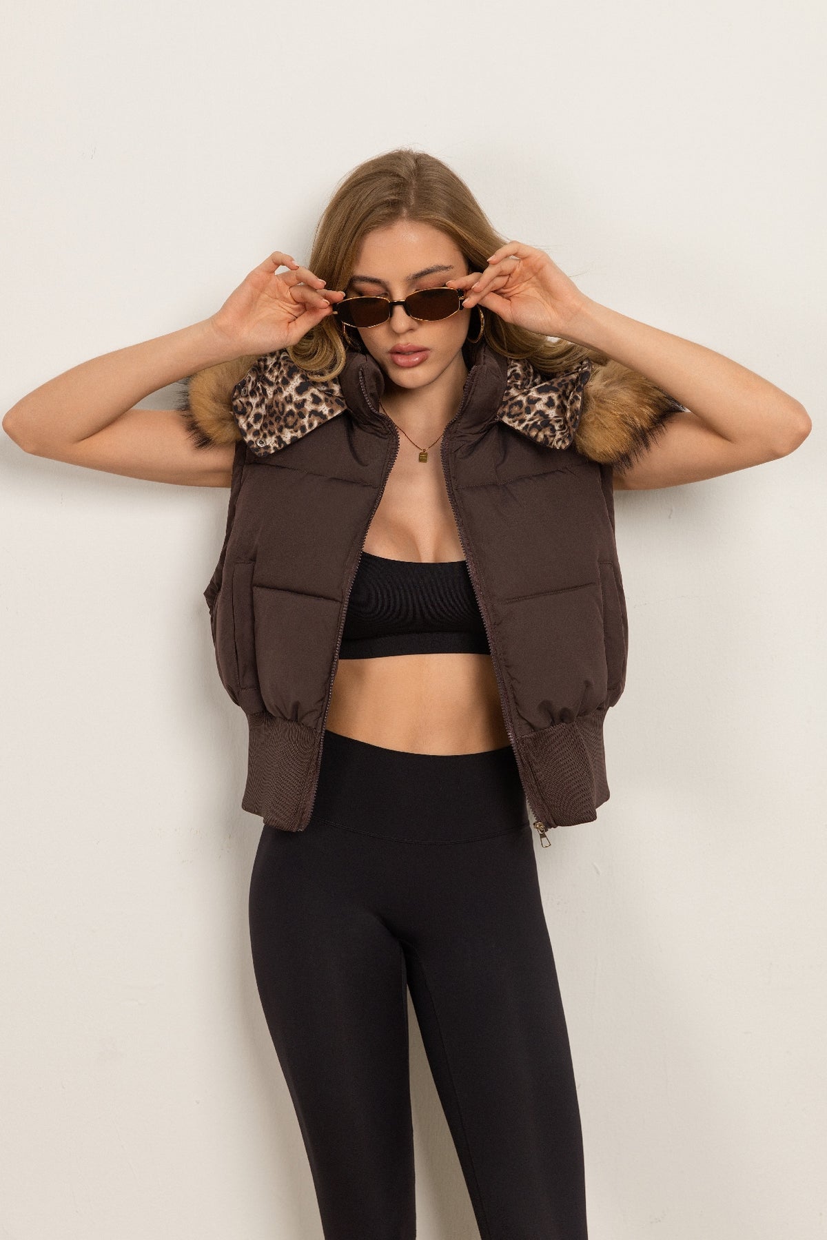 Classic Down Jacket Featuring A Detachable Fur Collar and An Attached Hood.