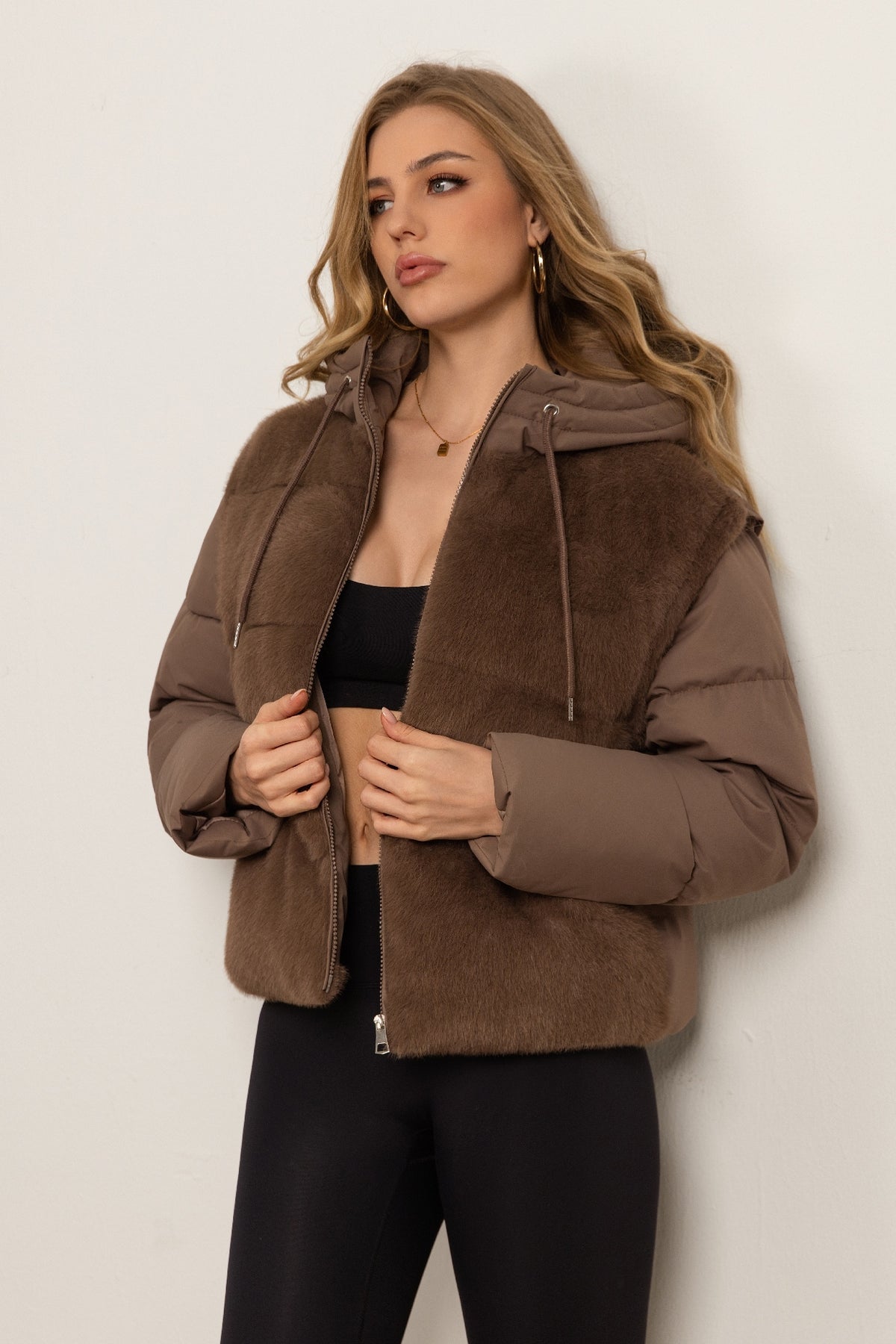 Down jacket with a plush front and detachable sleeves