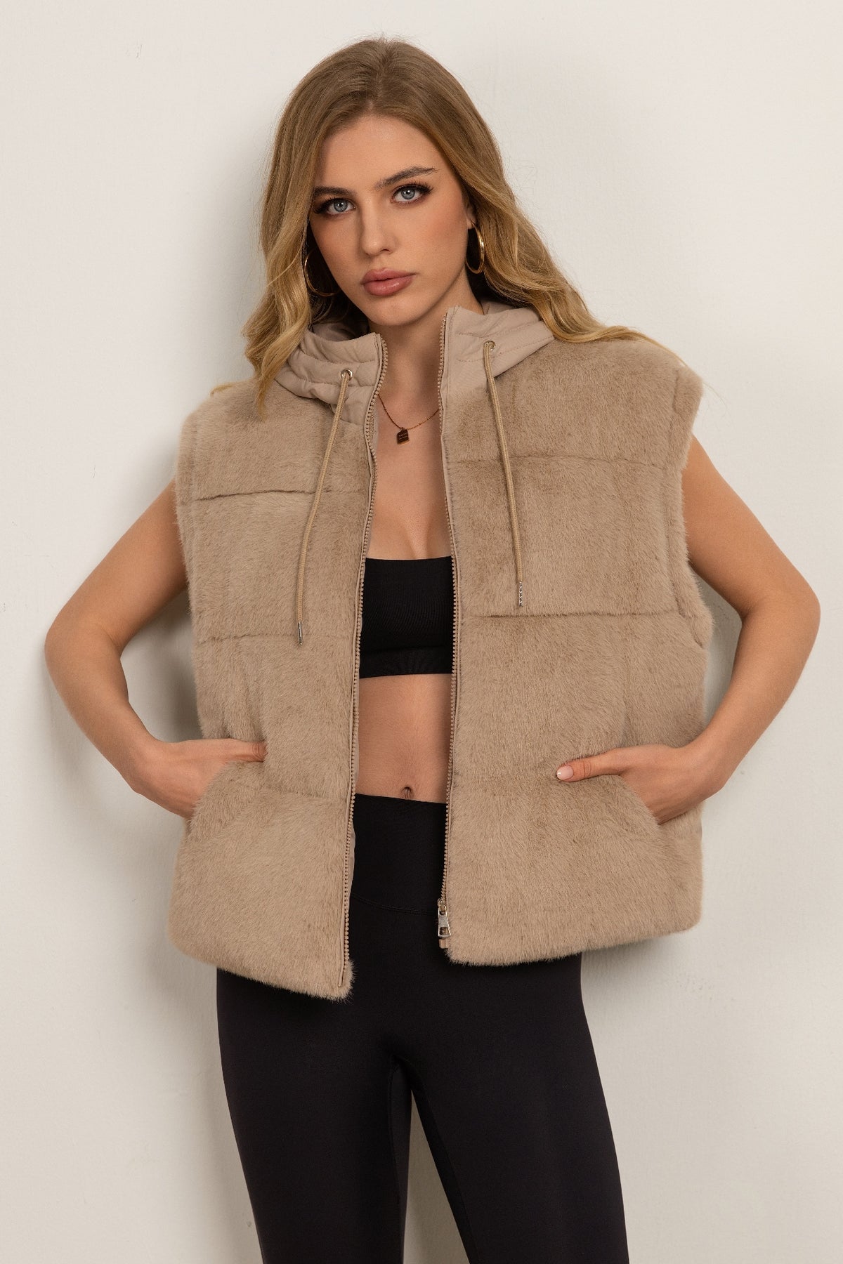 Down jacket with a plush front and detachable sleeves